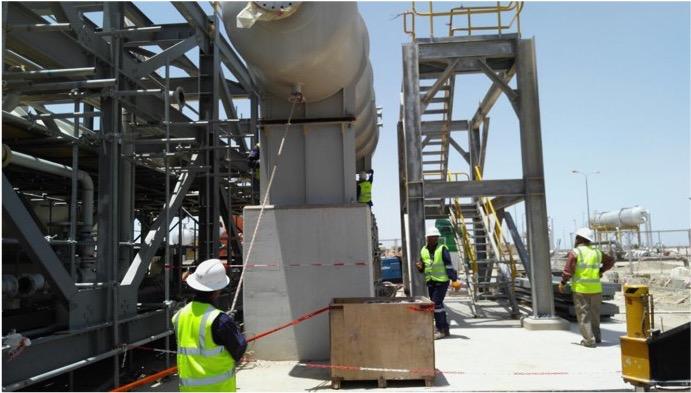 Site team working on structural and piping installation